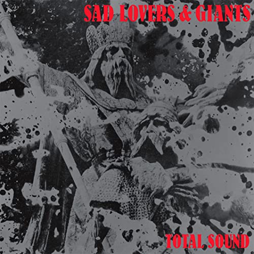 Black and white album cover with a skeletal figure and red text.