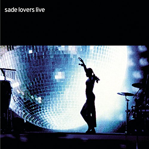 Sade album cover: silhouette of a singer on stage with drums.