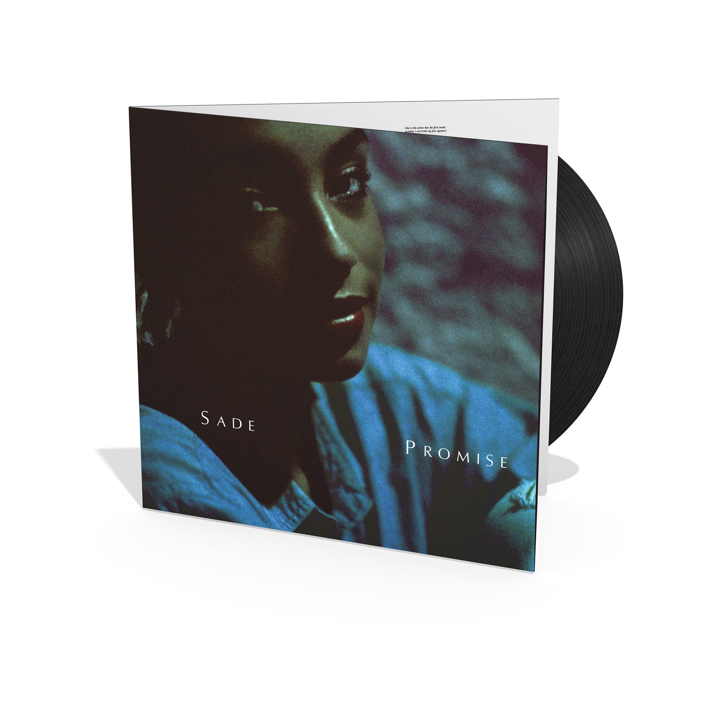 Sade Promise vinyl record album cover featuring a portrait of Sade in blue lighting.