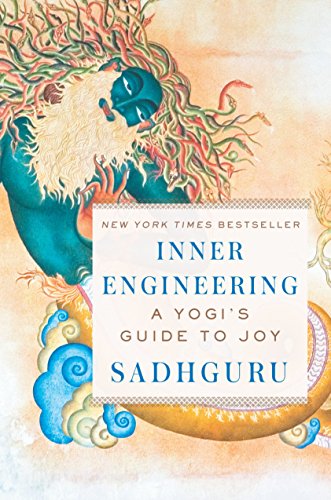 "Book cover of 'Inner Engineering' by Sadhguru, featuring a man with flowing hair."