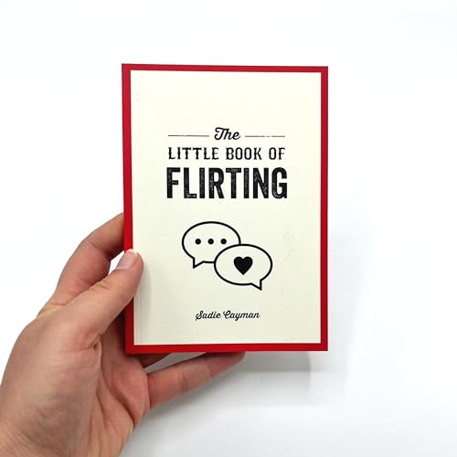 Small red-bordered book titled “The Little Book of Flirting” held in a hand.