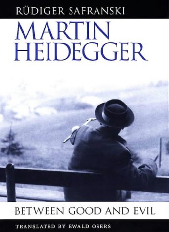 Book cover: Martin Heidegger portrait, titled “Between Good and Evil.”