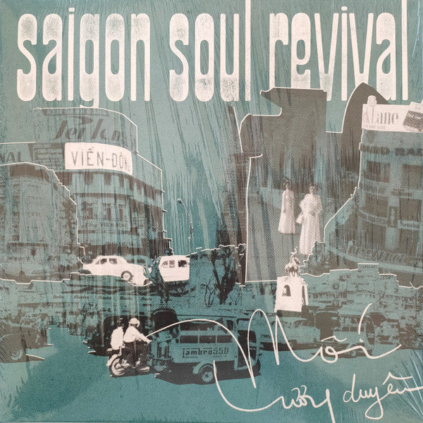 Vinyl record cover with a teal, textured cityscape and handwritten text.