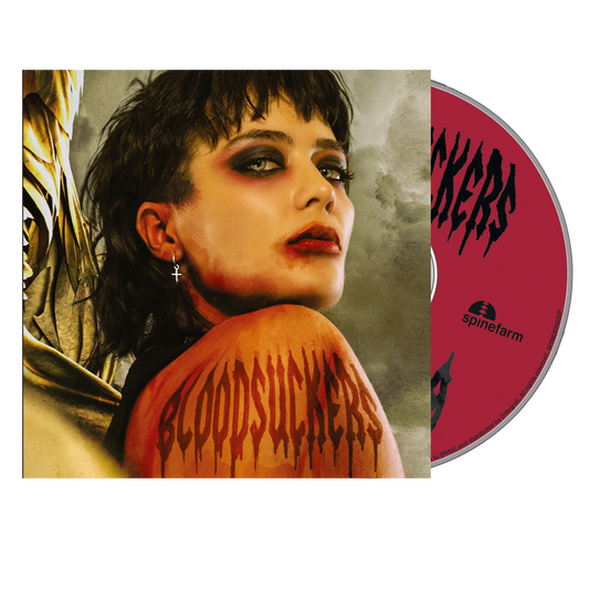 CD case featuring a woman with dramatic makeup and blood-like imagery.
