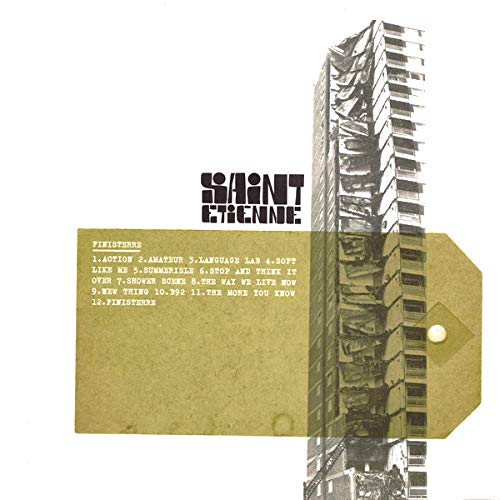 The image is a vinyl record cover for Saint Etienne's "Finisterre". The alt text is: "Vinyl record cover with tall building and 'Deluxe Edition' label."