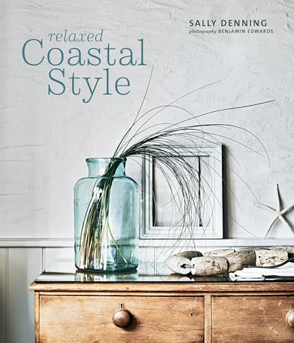 Book cover with vase of grasses, driftwood, and a starfish.