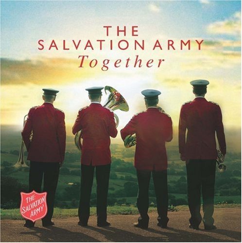 Salvation Army band members in red coats viewed from behind.