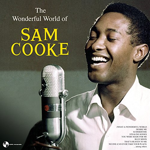 Sam Cooke smiling while singing into a vintage microphone on his album cover.