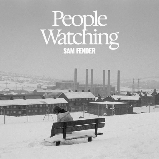 Black and white album cover: person on bench, snowy industrial landscape.