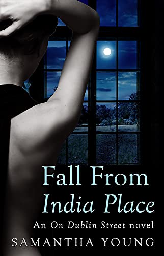 Book cover: woman’s back, window with moon, title “Fall From India Place.”