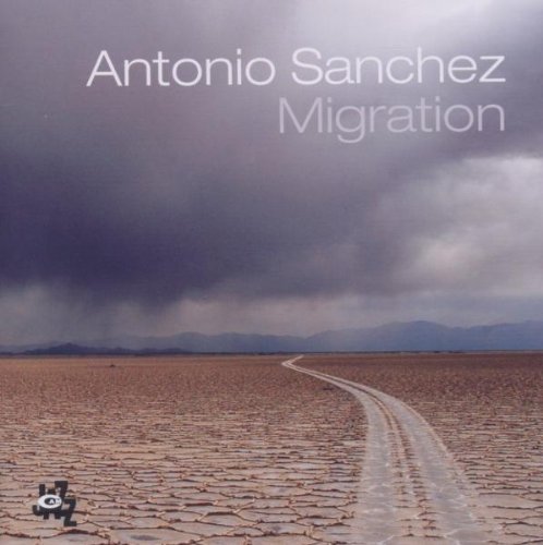 CD cover for Antonio Sanchez’s “Migration” featuring a cracked, dry landscape.