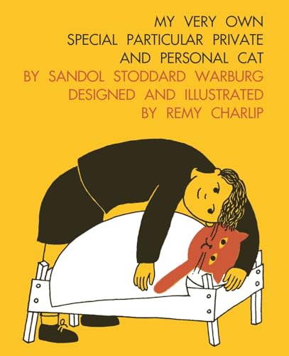 A child leans over a small bed where an orange cat lies under covers.