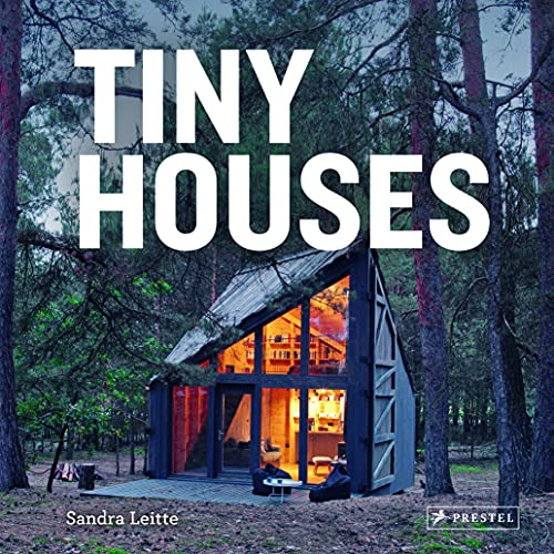 Book cover featuring a small, illuminated house in a forest.