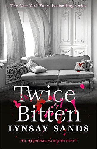 Book cover: ornate room, sofa, and title "Twice Bitten" with red splatters.