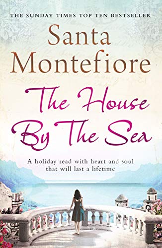 Book cover: "The House By The Sea" with woman overlooking the ocean.