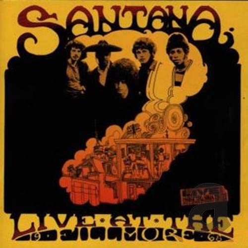Yellow album cover with band photo and ornate text reading Santana Live at the Fillmore.