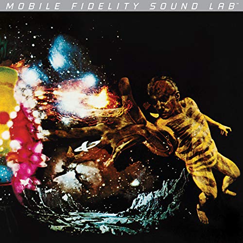 Santana 3 vinyl album cover: cosmic imagery with a figure and colors.