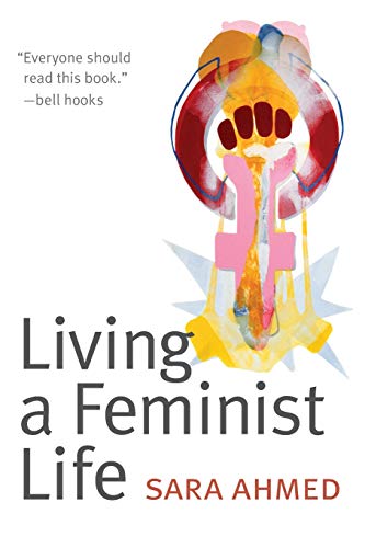 Book cover featuring a watercolor illustration of a raised fist inside a female symbol.