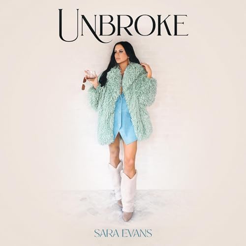 Sara Evans album cover, featuring a woman in a green coat and boots.