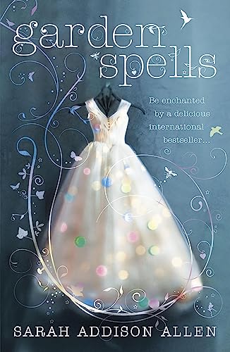 Book cover featuring a white dress with colorful lights against a blue background.