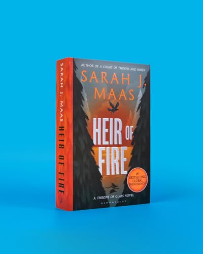 Book cover for "Heir of Fire" by Sarah J. Maas, with fiery imagery.