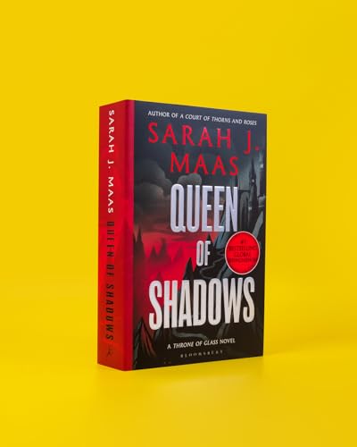 The book Queen of Shadows by Sarah J. Maas against a solid yellow background.