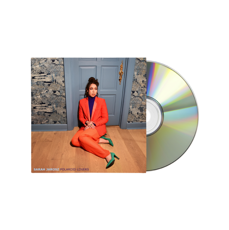 CD case featuring Sarah Jarosz in an orange suit, with a silver disc.