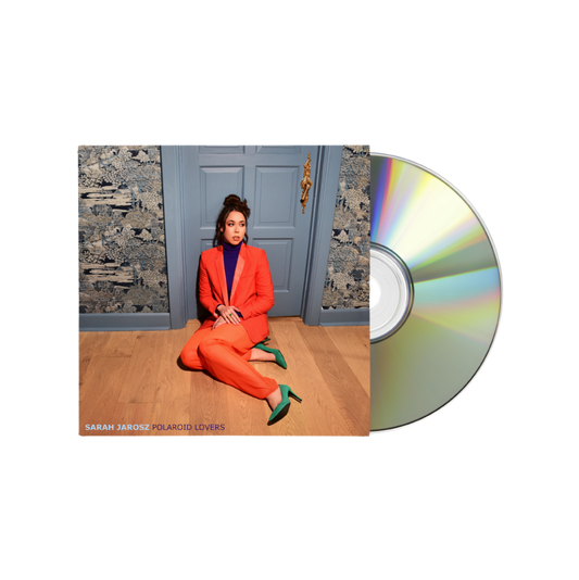 CD case featuring Sarah Jarosz in an orange suit, with a silver disc.
