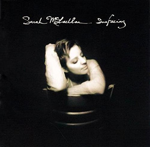 Sarah McLachlan album cover, "Surfacing," showing a woman with closed eyes.