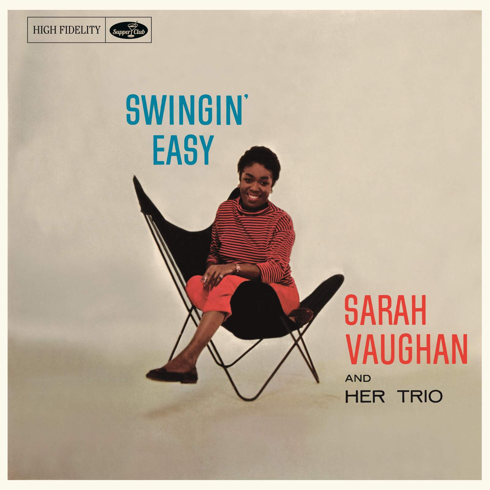 Sarah Vaughan album cover: portrait of a smiling woman in a chair.