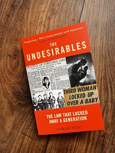 Book cover with red borders, black and white archival photos, and bold white text.
