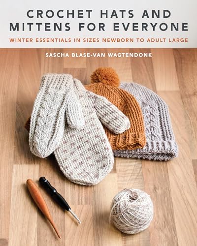 Book cover featuring crochet hats, mittens, yarn, and hooks on a wooden floor.