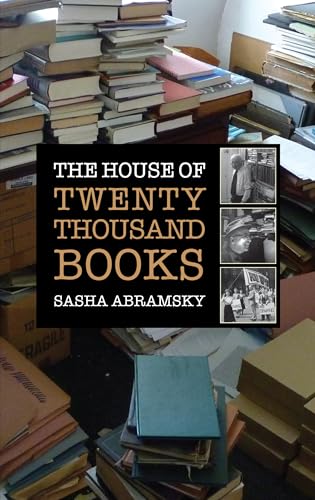 Book cover with title and stacked books in a cluttered room.