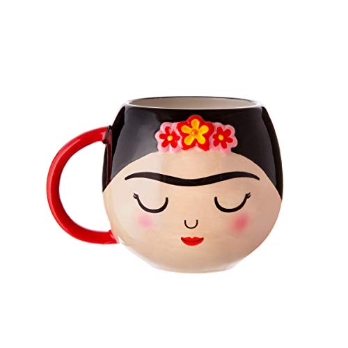Ceramic mug shaped like Frida Kahlo’s face with floral headpiece.