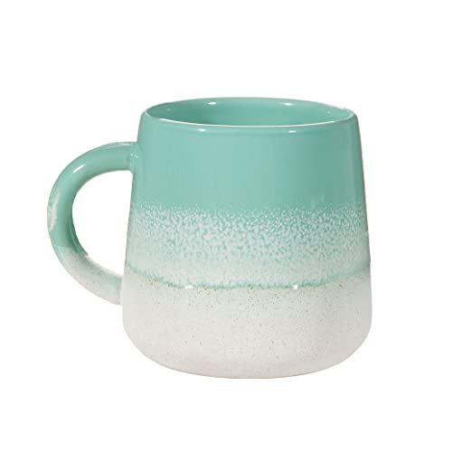 Mint green ceramic mug with a textured, ombre glaze effect.