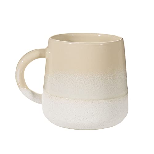 Beige ceramic mug with a textured base and rounded handle.