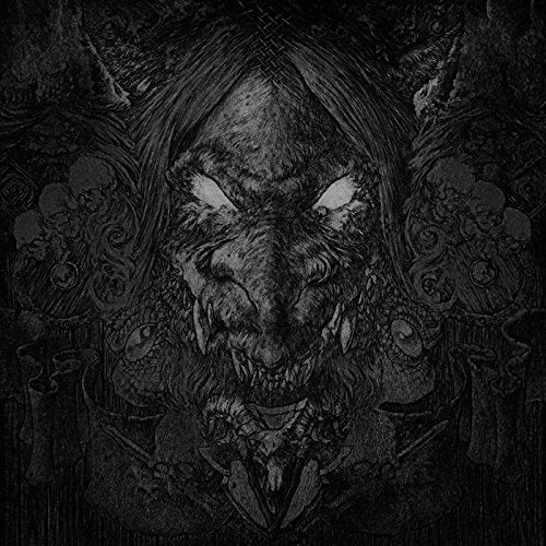 Black and white illustration of a monstrous, snarling face with glowing eyes.