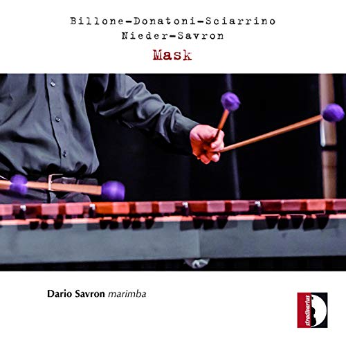 "CD cover featuring a person playing marimba with mallets, against a dark background."