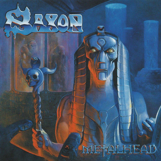 Saxon “Metalhead” CD cover: fantasy art with a robotic sphinx and skull.