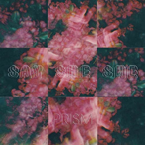 Album cover with a grid of pink flowers and the text Say She She Prism.