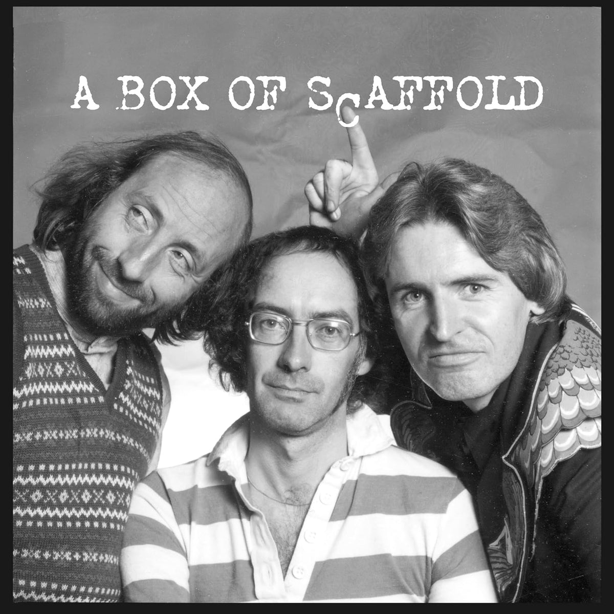 Black and white photo of three men, album cover for Scaffold.