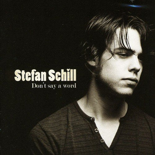 CD cover featuring a close-up portrait of Stefan Schill in grayscale.