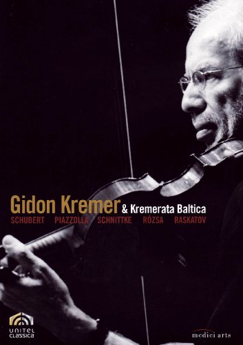 Gidon Kremer playing violin on DVD cover, black and white image.