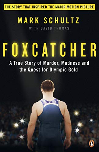 Book cover: wrestler’s back facing crowd, dark background, bold title “Foxcatcher”.