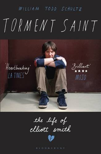 Book cover featuring portrait of musician Elliott Smith, arms crossed.