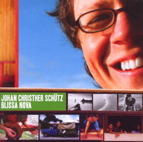 CD cover featuring Johan Christher Schütz smiling with a blue sky background.