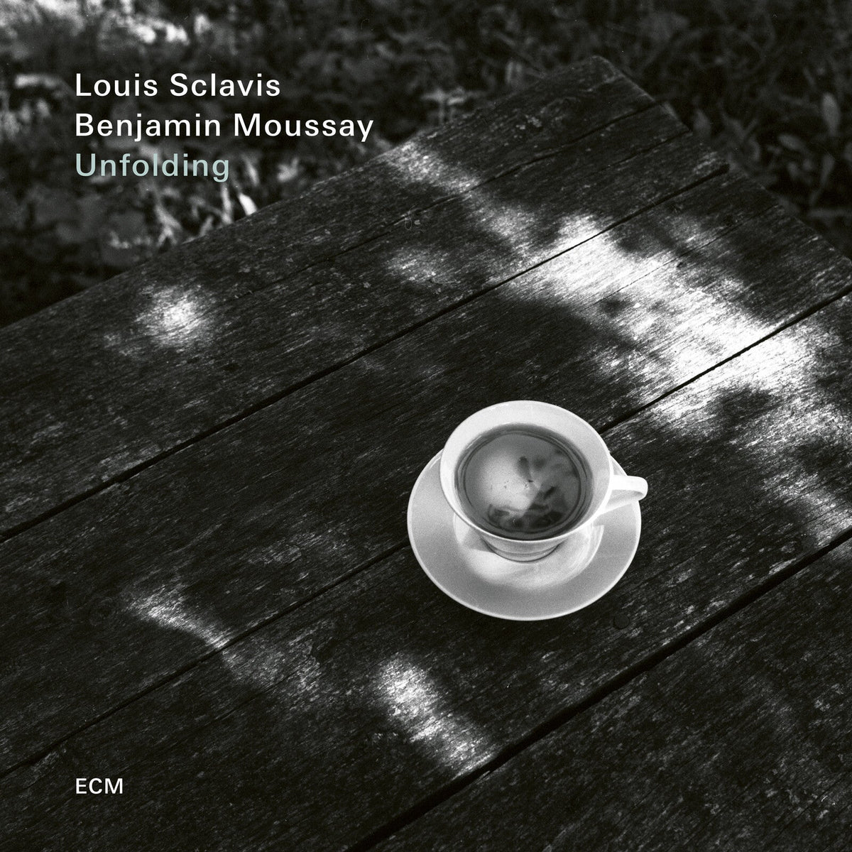 CD cover: black and white photo of a coffee cup on wood.