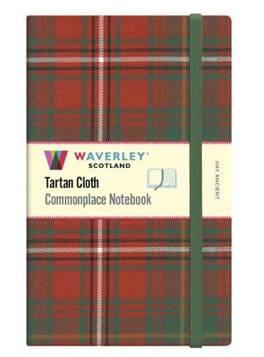 Red and green tartan notebook with elastic closure and label.