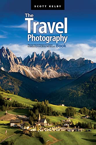 Book cover with mountain landscape and village scene.