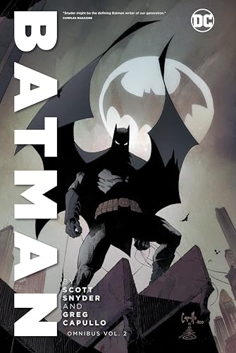 Batman stands silhouetted against a moonlit, angular cityscape.